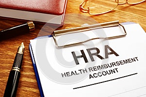 Health Reimbursement Account HRA with clipboard.