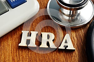 Health Reimbursement Account HRA  letters on desk