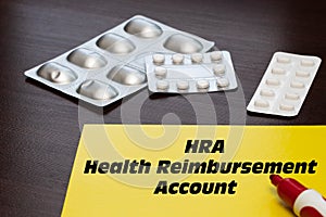 Health Reimbursement Account HRA, the text is written on a yellow sheet