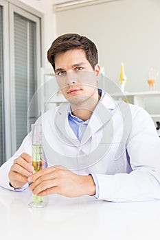 Health researcher researcher working in a biological science lab, male research scientist