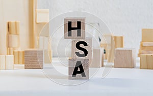 Health Savings Account HSA letters from wooden blocks