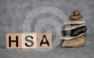 Health Savings Account HSA letters from wooden blocks