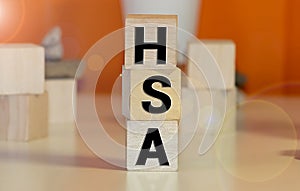 Health Savings Account HSA letters from wooden blocks