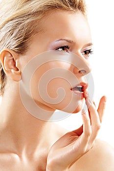 Health & skin care. Lovely woman touching her lips