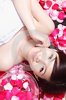 Health spa woman Face with red rose
