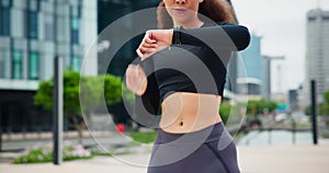 Health stats, check smart watch and woman with fitness, time and exercise with progress and training. New York, athlete