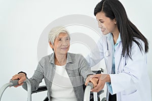 Health visitor and a senior woman during home visit