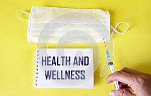 Health and wellness - healthy lifestyle concept - text on notepad