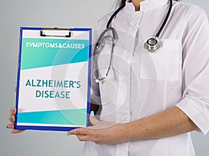 Healthcare concept about ALZHEIMER`S DISEASE with inscription on the piece of paper