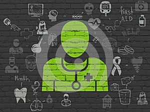 Healthcare concept: Doctor on wall background