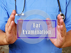 Healthcare concept about Ear Examination with sign on the piece of paper