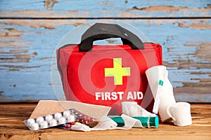 Healthcare concept with First Aid kit photo