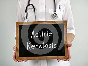 Healthcare concept meaning Actinic Keratosis with inscription on the piece of paper