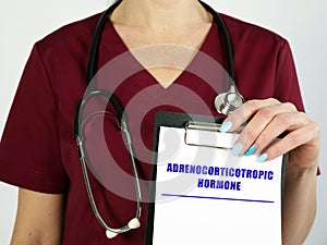 Healthcare concept meaning ADRENOCORTICOTROPIC HORMONE with sign on the page photo