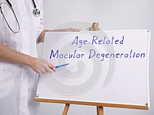 Healthcare concept meaning Age-Related Macular Degeneration Macular Degeneration with phrase on the piece of paper photo