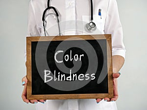 Healthcare concept meaning Color Blindness with phrase on the piece of paper