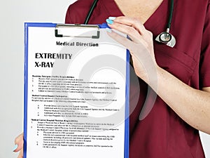 Healthcare concept meaning EXTREMITY X-RAY with phrase on the sheet