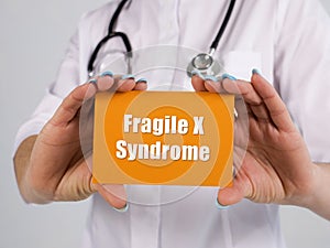 Healthcare concept meaning Fragile X Syndrome with inscription on the piece of paper photo