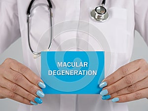 Healthcare concept meaning MACULAR DEGENERATION with phrase on the piece of paper photo