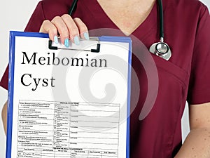 Healthcare concept meaning Meibomian Cyst Chalazion with inscription on the page photo