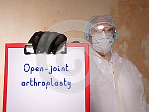 Healthcare concept meaning Open-joint arthroplasty with sign on the piece of paper