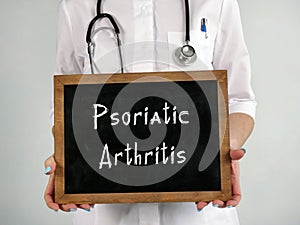 Healthcare concept meaning Psoriatic Arthritis with phrase on the piece of paper