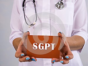 Healthcare concept meaning SGPT Serum Glutamate-pyruvate Transaminase with phrase on the sheet