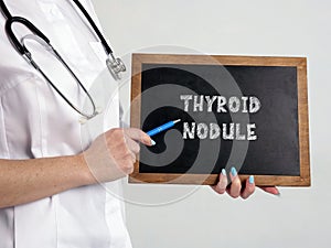 Healthcare concept meaning THYROID NODULE with inscription on the chalkboard photo