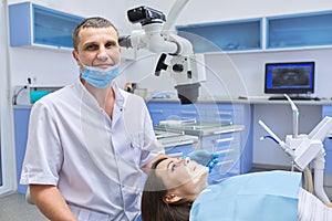 Healthcare dentistry medicine, male doctor dentist treating teeth