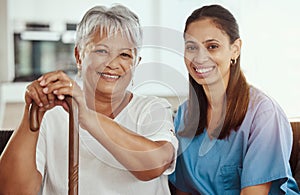 Healthcare, doctor and elderly woman bonding, sitting on sofa during a checkup at assisted living facility. Senior care