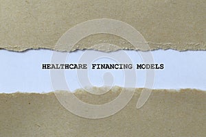 healthcare financing models on white paper