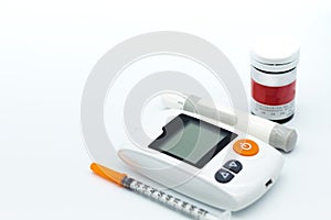 Healthcare: Glucose meter and syringe. Image use for medicine, diabetes, glycemic, health care, people concept background