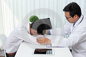 Healthcare and medical concept, Doctor try to comforting after explain symptoms and medical treatment to patient in hospital