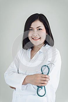 Healthcare Medical Consulting Concept, Female Medicine Doctor With Holding Stethoscope Standing Against Isolated Background.