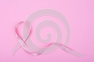 Healthcare, medicine concept. Pink breast cancer awareness ribbon and help illness people