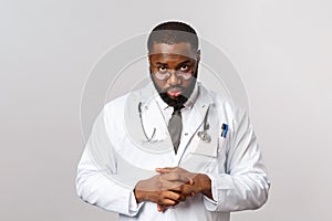 Healthcare, medicine and hospital treatment concept. Serious-looking professional doctor, african-american physician or