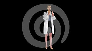 Healthcare, medicine and technology concept - smiling female doctor pointing to something or pressing imaginary buttons