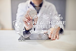 Healthcare mobile apps. Modern medical technology on virtual screen.