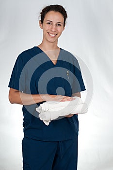 Healthcare professional in blue scrubs