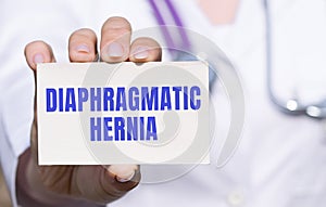 The healthcare professional is holding a diaphragmatic hernia card