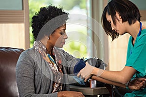 Healthcare providers instructing a patient.