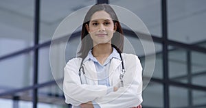 Healthcare, woman and doctor with smile and arms crossed for trust, medicine or cardiology at hospital or clinic