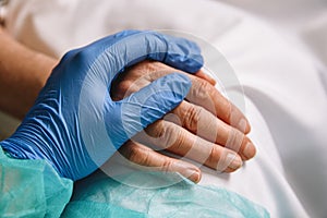 Healthcare worker giving support and love to a patient