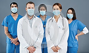 Healthcare workers are more important now than ever before. Portrait of a group of medical practitioners wearing face