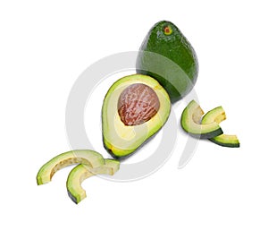 Healthful and fresh whole and half avocados with a large stone, isolated on a white background. Healthful lifestyle.