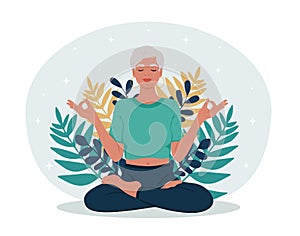 Healthy Aging month. Elderly woman with closed eyes meditating in yoga lotus posture.