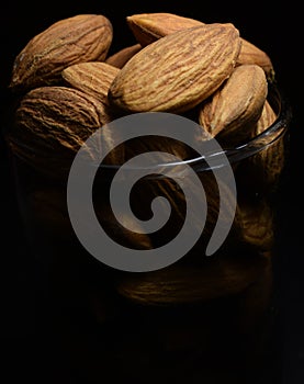 Healthy almond in a small glass