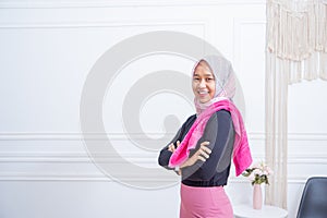 Healthy asian muslim woman with hijab doing exercise at home