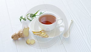 Healthy ayurvedic tea with ginger and mint leaves