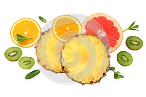 healthy background. slices of grapefruit, kiwi fruit, orange and pineapple isolated on white background top view